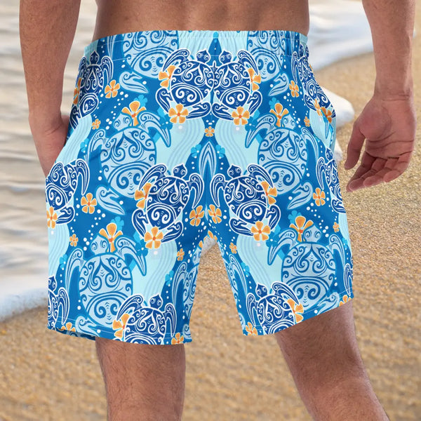 Blue swim shorts with swirling floral pattern from HAWAII TURTLES Retro Board Shorts UPF 50+