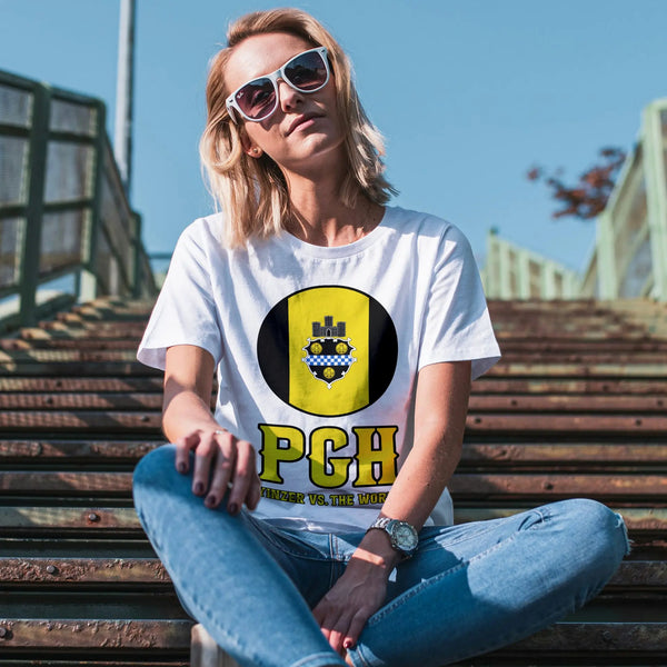 Woman in PGH ring-spun cotton tee relaxing on wooden steps