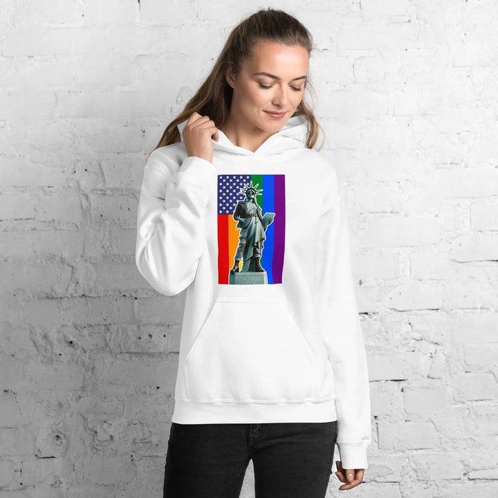 Unisex hoodie with Statue of Liberty graphic on rainbow flag background for LGBTQ+ pride