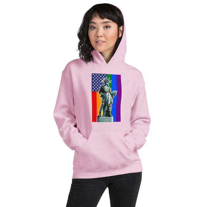 Pink hoodie featuring a colorful Statue of Liberty design for LGBTQ+ pride - Unisex Pride N Liberty
