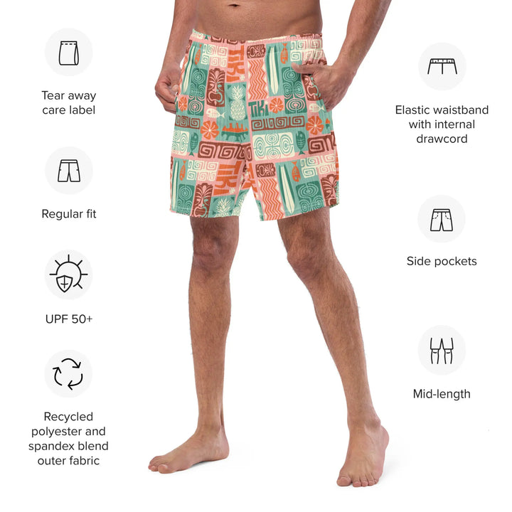 Colorful TIKI RETRO board shorts with labels showing features of these custom swim trunks