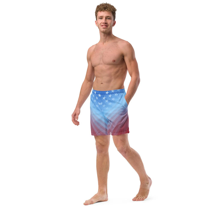 Shirtless man rocking USA Faded board shorts perfect for summer vibes and sun protection