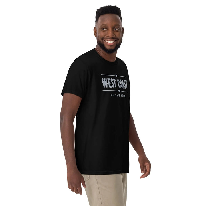 Smiling man in a ’WEST COAST’ t-shirt from our premium heavy-duty brand collection